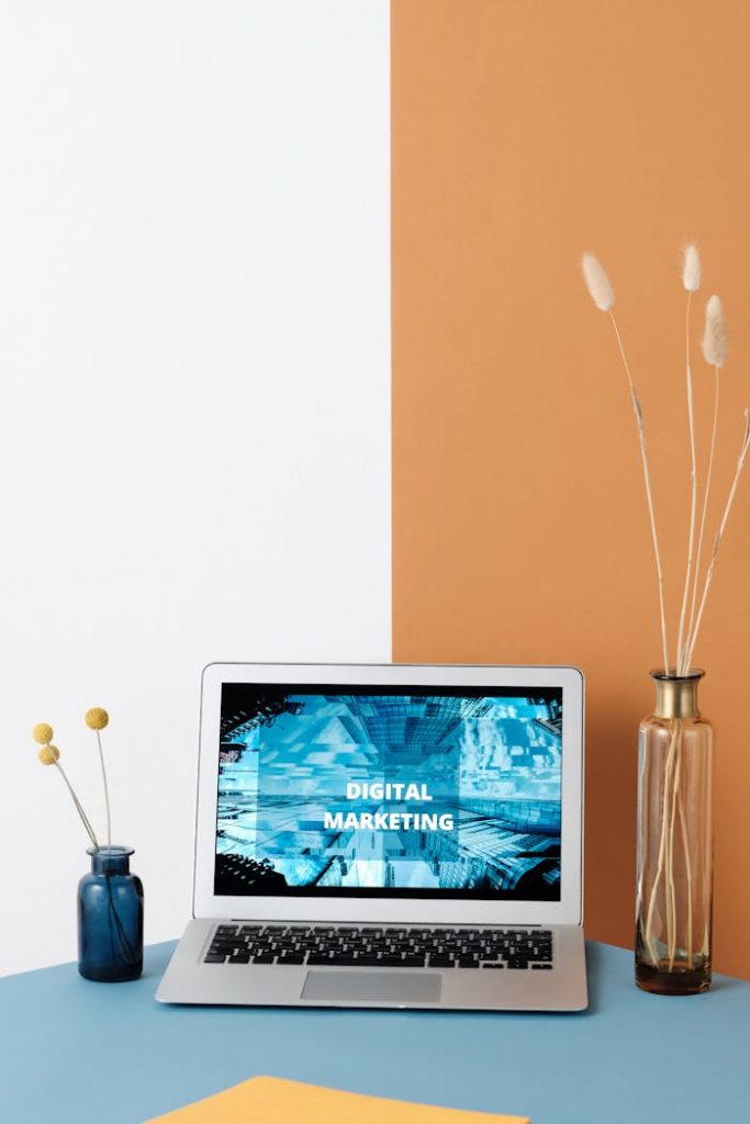 Crafting Captivating Headlines: Your awesome post title goes here Sleek laptop displaying digital marketing on a stylish minimalist desk with modern decor.